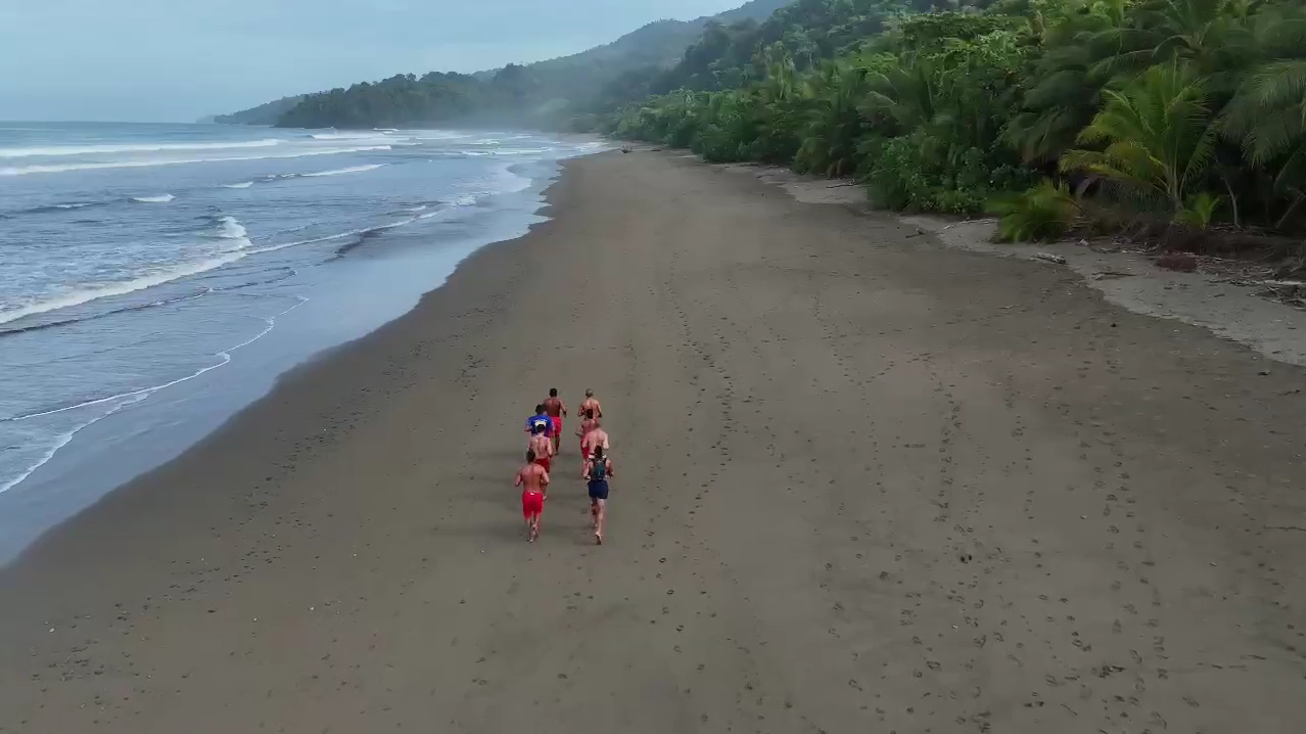 Costa Ballena lifeguards running together along the beach